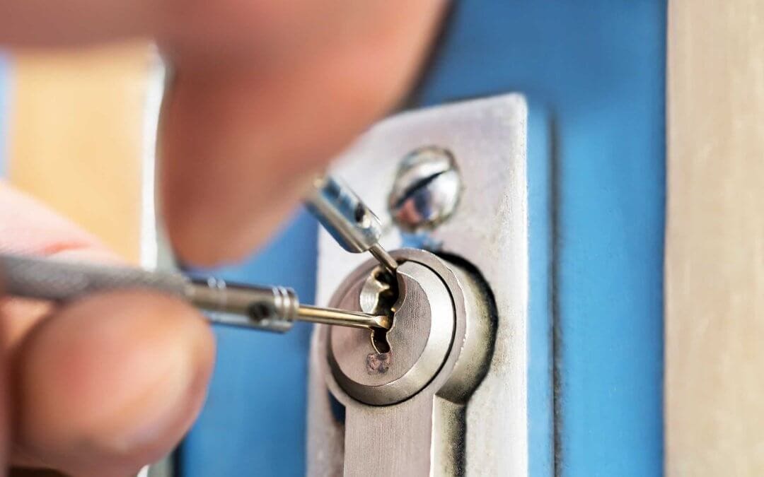 How does a locksmith get into a locked door?